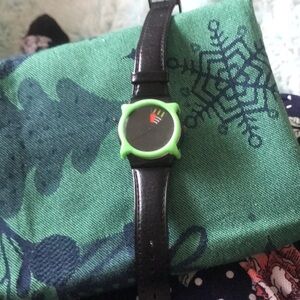 Black Swatch with a green swatch guard.  Swatch watch G5701 1988.  B1